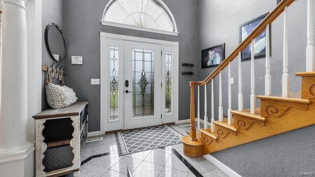 entrance foyer with ornate columns