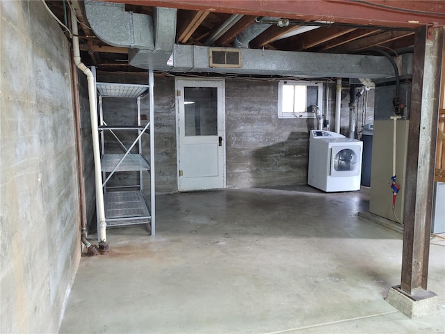 below grade area with washer / dryer and visible vents