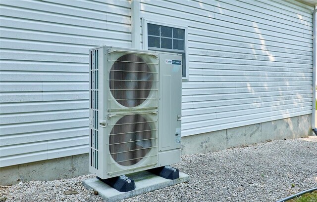 exterior details featuring ac unit