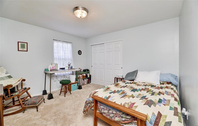 carpeted bedroom with a closet