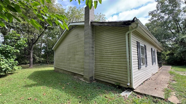 view of property exterior featuring a yard