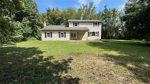 view of front facade with a front lawn