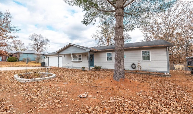 single story home featuring a garage