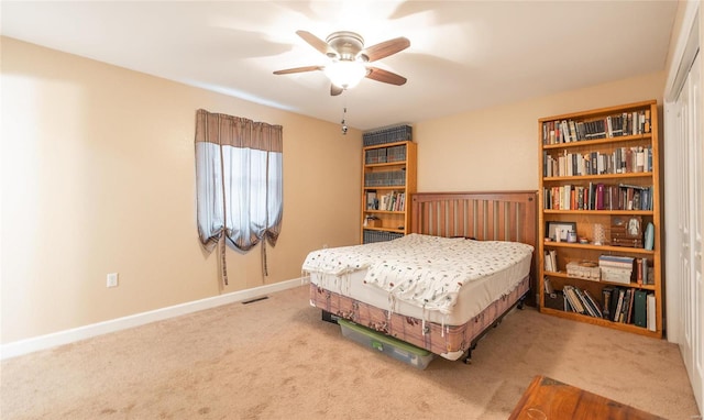 bedroom featuring ceiling fan and carpet flooring