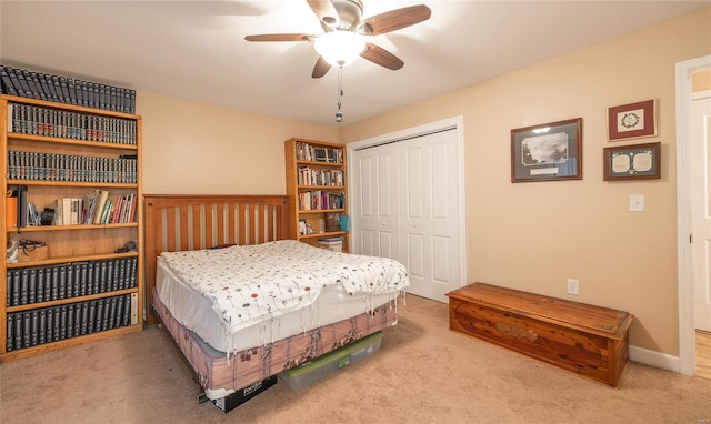 bedroom featuring a closet, carpet, and ceiling fan