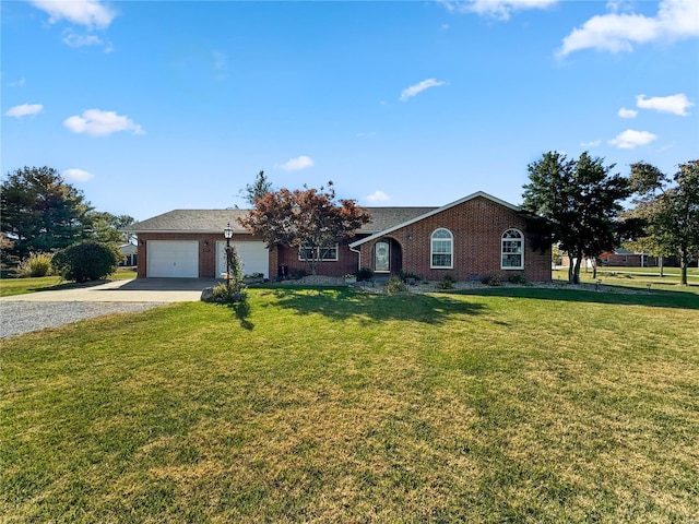 single story home featuring a front yard and a garage