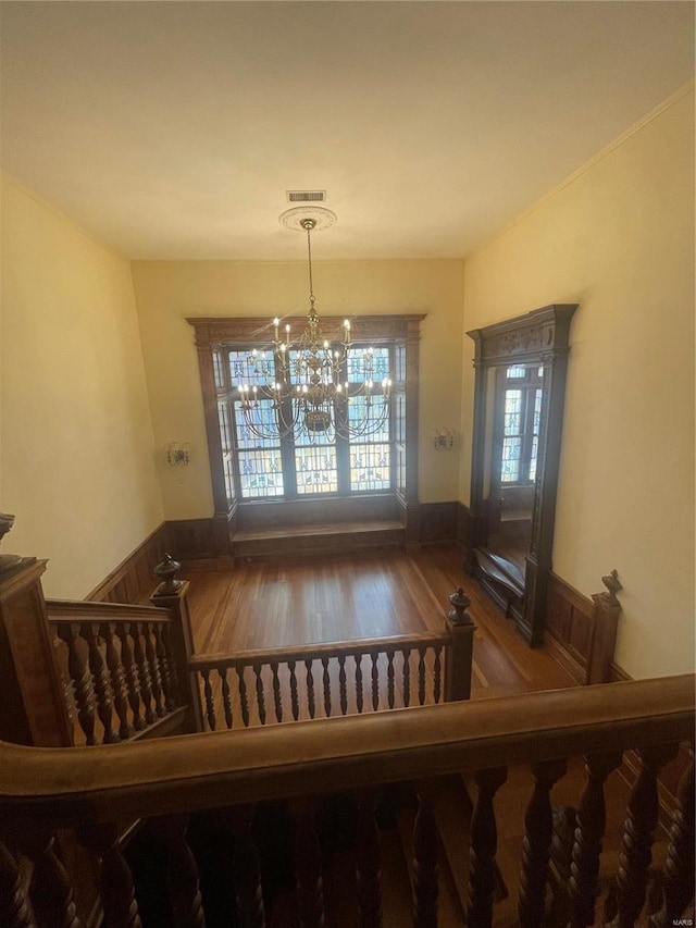 dining room featuring hardwood / wood-style floors and a notable chandelier