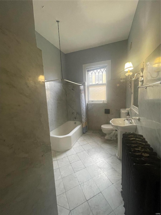 bathroom with shower / tub combo with curtain, radiator, toilet, and tile walls