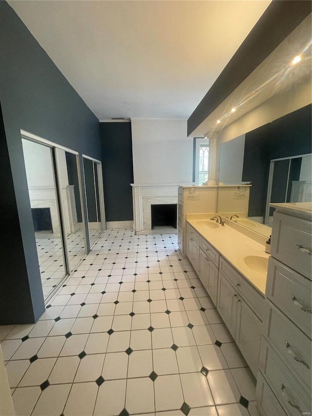 bathroom with tile patterned floors and sink