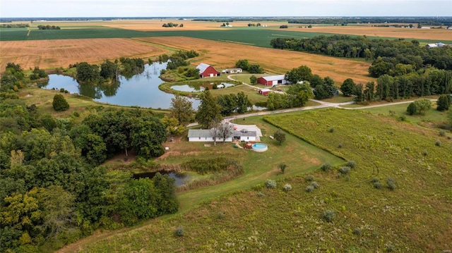 drone / aerial view featuring a rural view and a water view