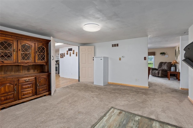 living room with light colored carpet