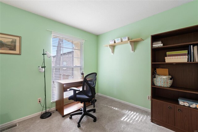 office space featuring light colored carpet