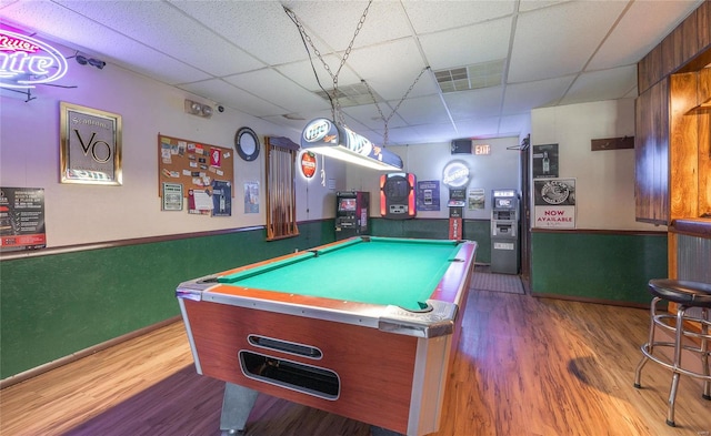 rec room with hardwood / wood-style flooring, billiards, and a drop ceiling