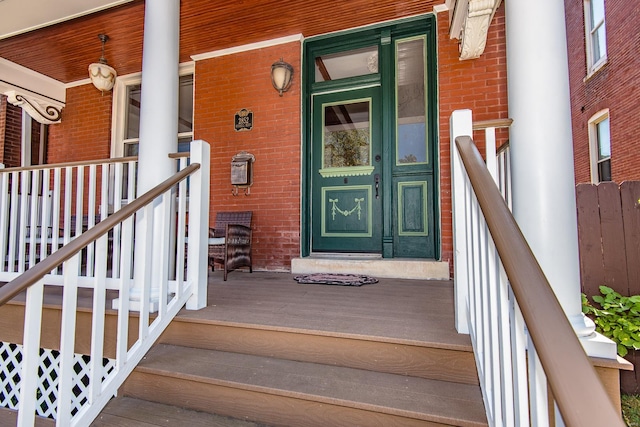 doorway to property with covered porch