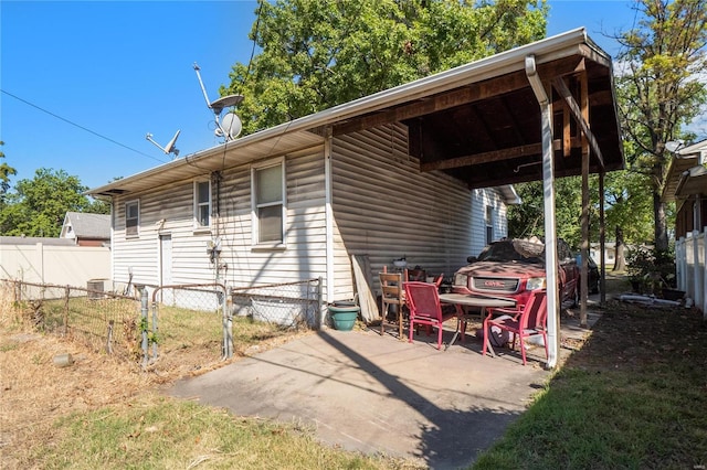 rear view of house featuring a patio area