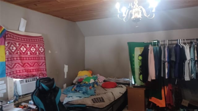 bedroom featuring a chandelier, wooden ceiling, and vaulted ceiling