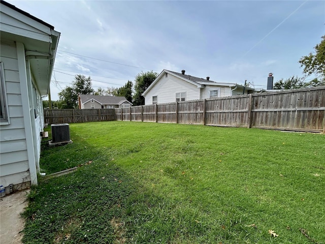 view of yard featuring central AC unit