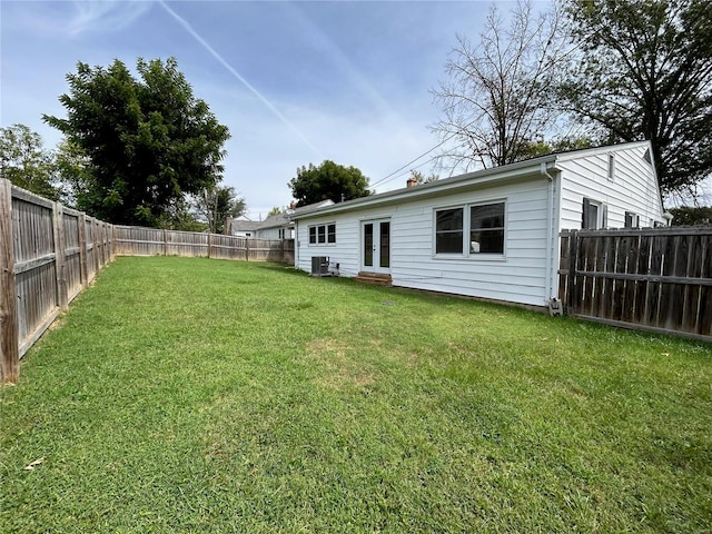 view of yard featuring central AC unit