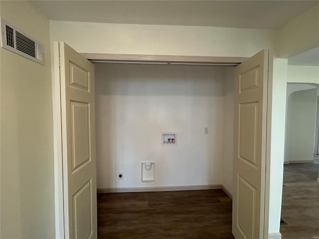 clothes washing area with electric dryer hookup, washer hookup, and dark hardwood / wood-style flooring