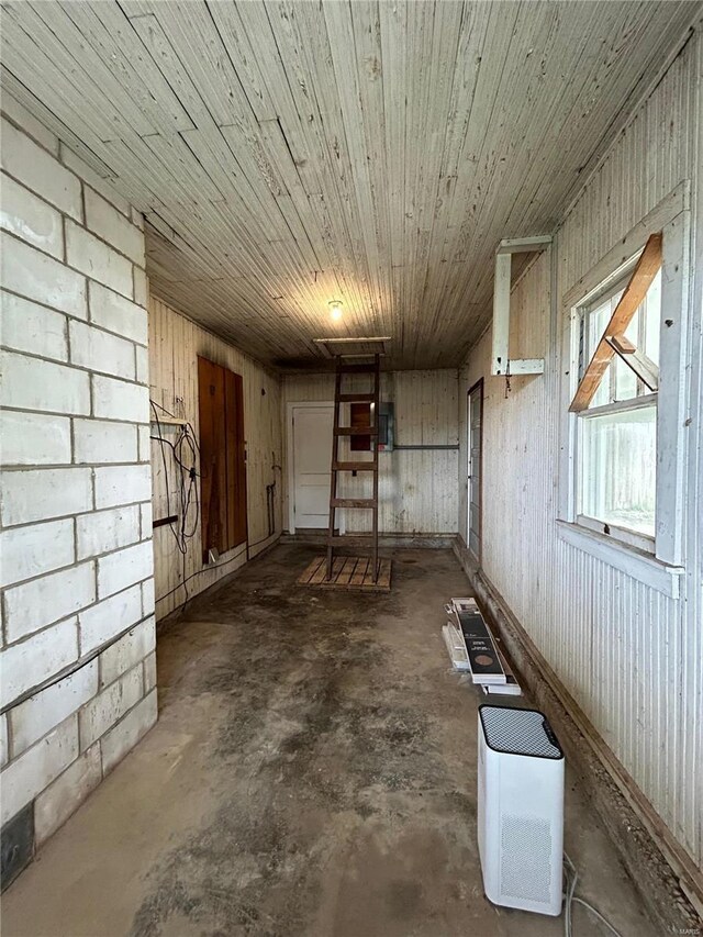 basement featuring wooden ceiling