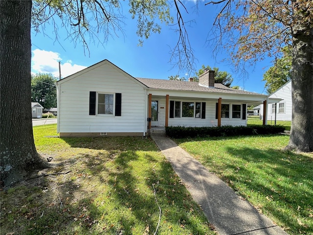 single story home featuring a front yard