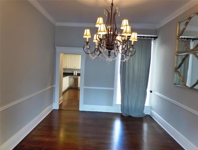 unfurnished dining area featuring dark hardwood / wood-style flooring, an inviting chandelier, and ornamental molding