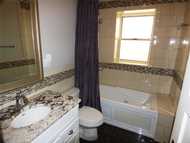 full bathroom featuring toilet, tile patterned floors, vanity, tile walls, and shower / bath combination with curtain