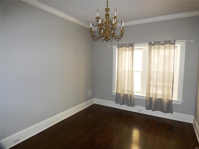 spare room with ornamental molding, a notable chandelier, and dark hardwood / wood-style flooring