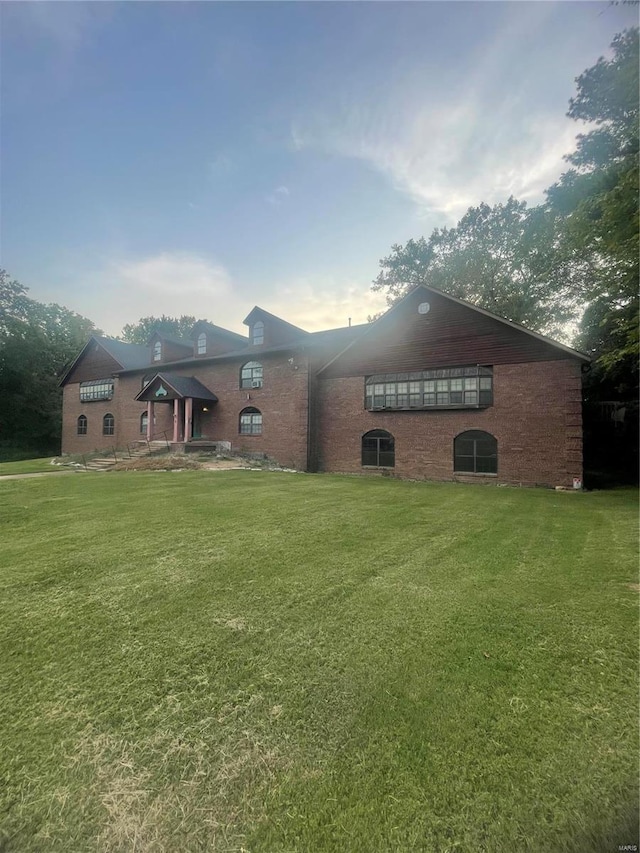 exterior space with a front yard