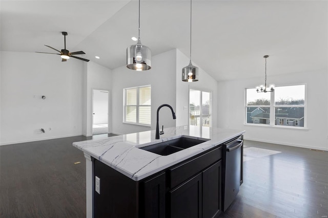 kitchen with ceiling fan with notable chandelier, sink, dark hardwood / wood-style floors, an island with sink, and stainless steel dishwasher