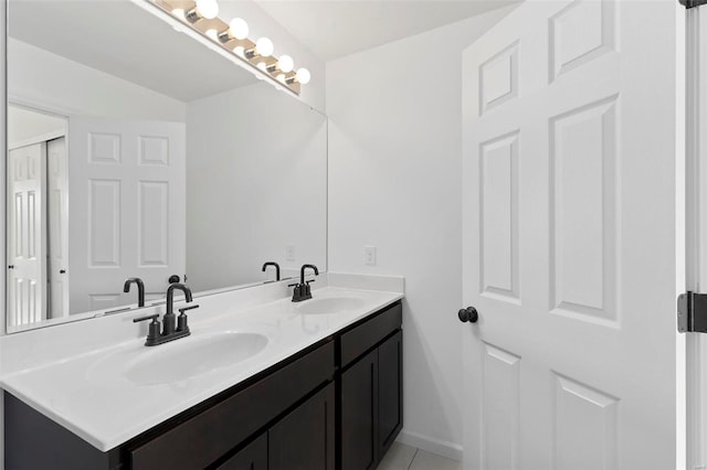 bathroom featuring tile patterned floors and vanity