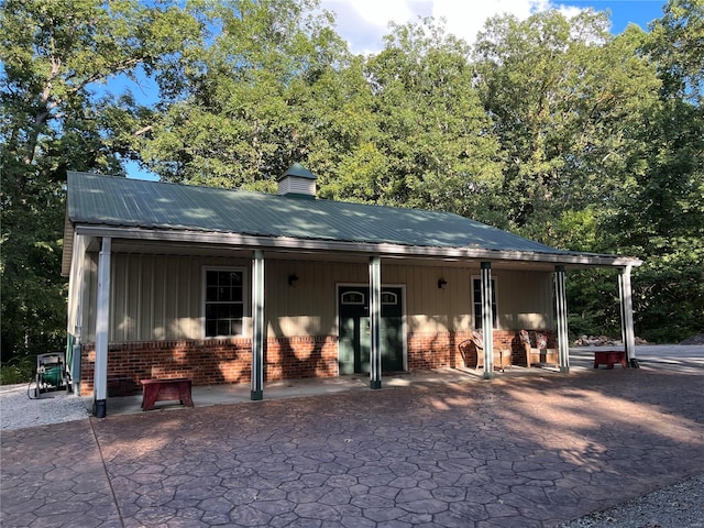 rear view of house with a patio area