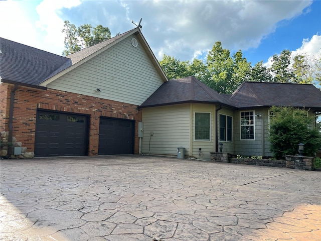 exterior space with a garage