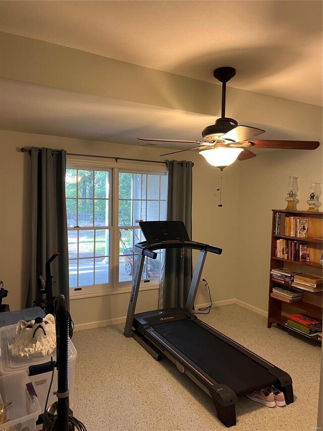 workout room featuring ceiling fan