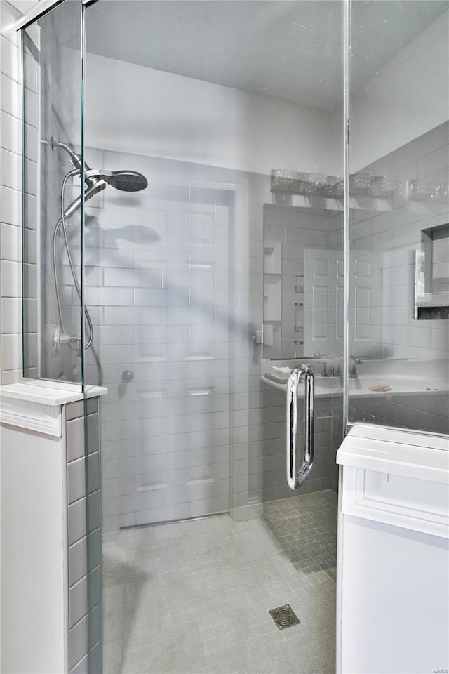 bathroom featuring walk in shower