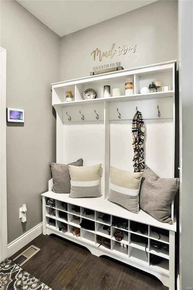 mudroom with hardwood / wood-style floors