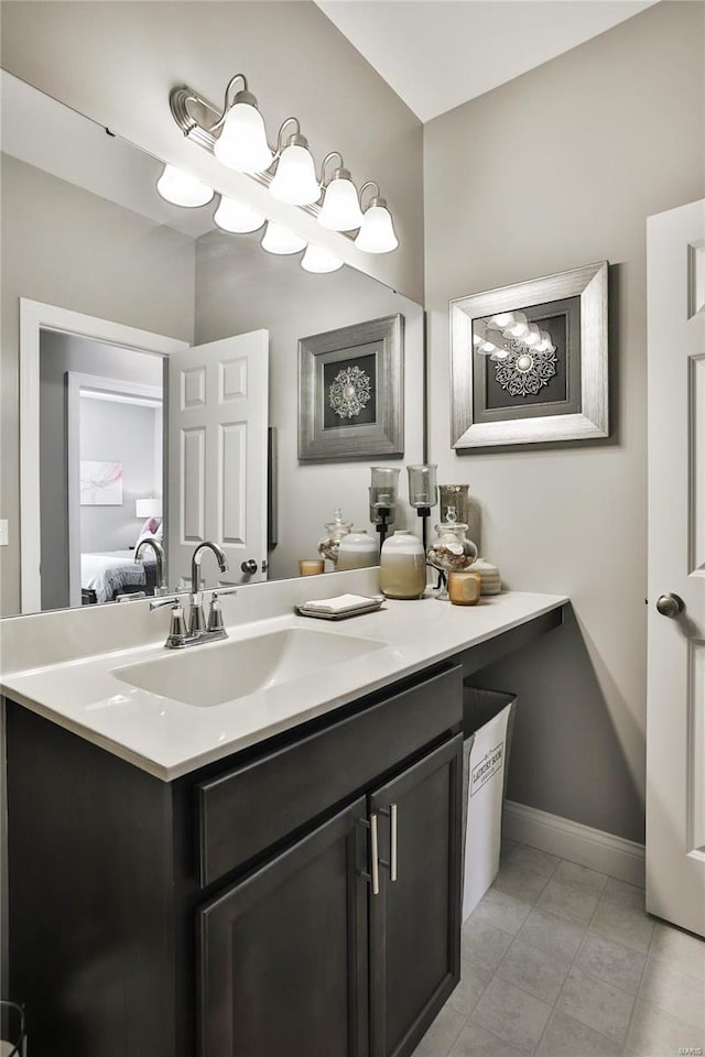 bathroom with vanity and tile patterned floors