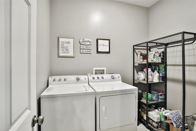 laundry area with separate washer and dryer