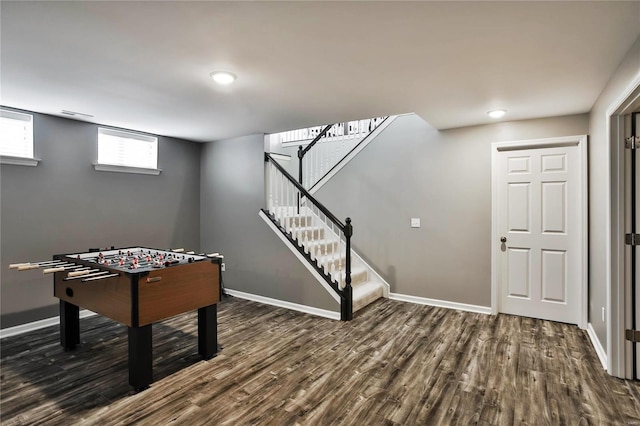 recreation room featuring dark hardwood / wood-style floors