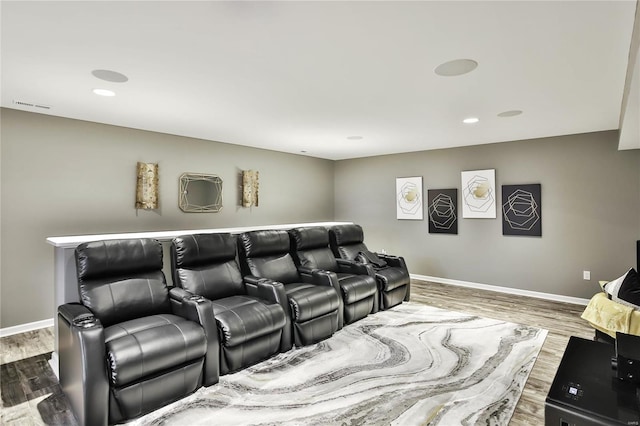 home theater featuring wood-type flooring