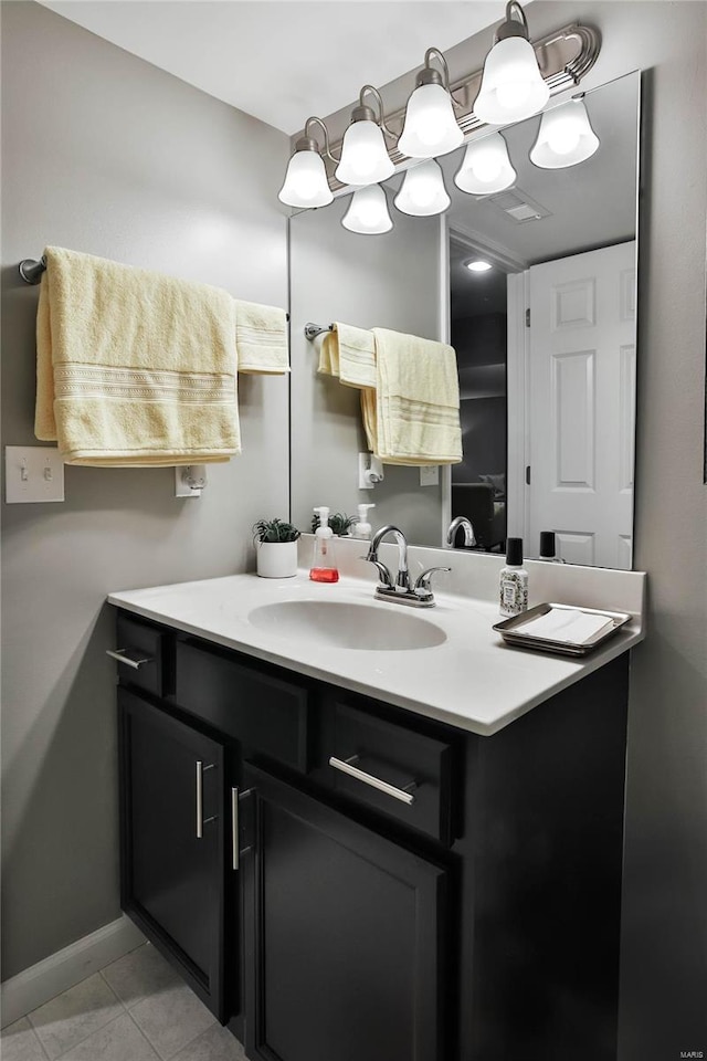 bathroom featuring tile patterned floors and vanity