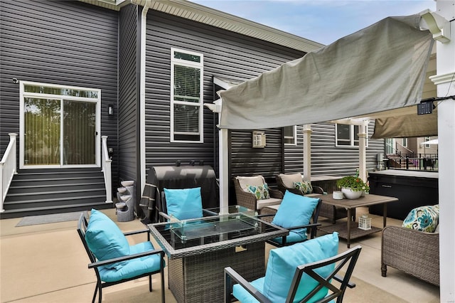 view of patio / terrace featuring grilling area and outdoor lounge area