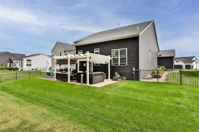 back of property with a pergola, a patio area, a yard, and a hot tub