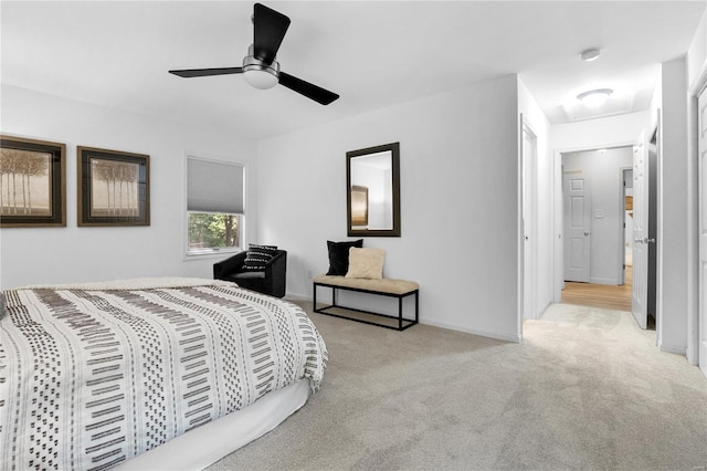 carpeted bedroom with ceiling fan