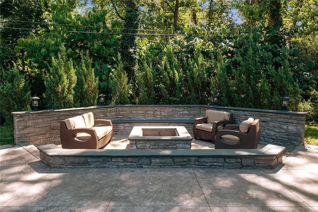 view of patio / terrace featuring a fire pit