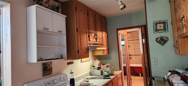 kitchen with light tile patterned floors