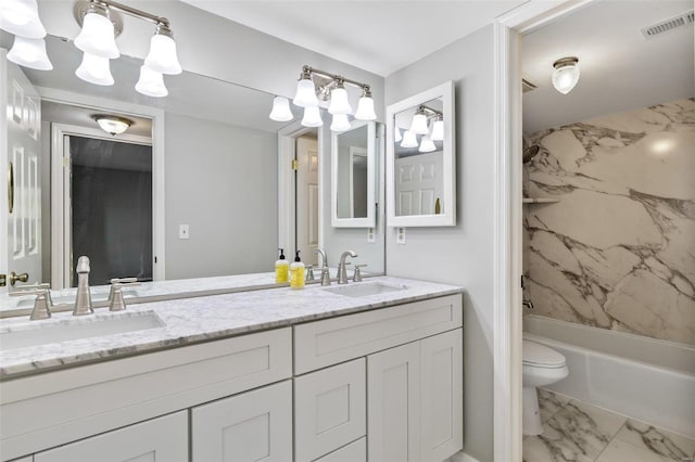 full bathroom with toilet,  shower combination, and vanity