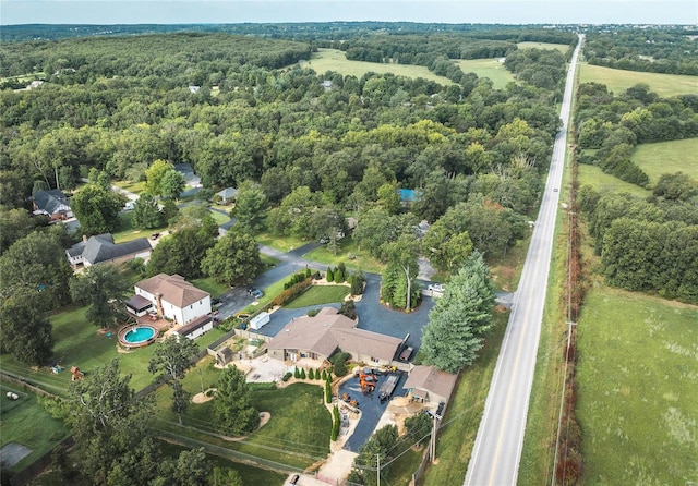 bird's eye view featuring a view of trees