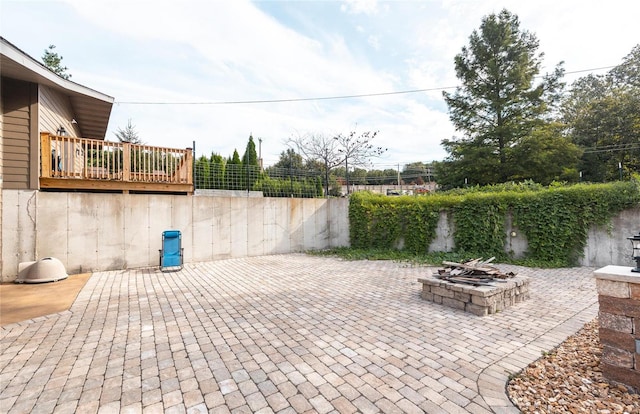 view of patio / terrace with a fire pit