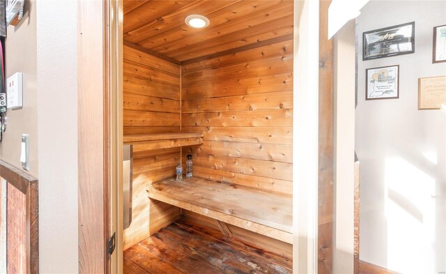 view of sauna / steam room with hardwood / wood-style flooring and wooden ceiling